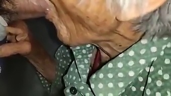 Elderly Asian Woman'S Intimate Encounter